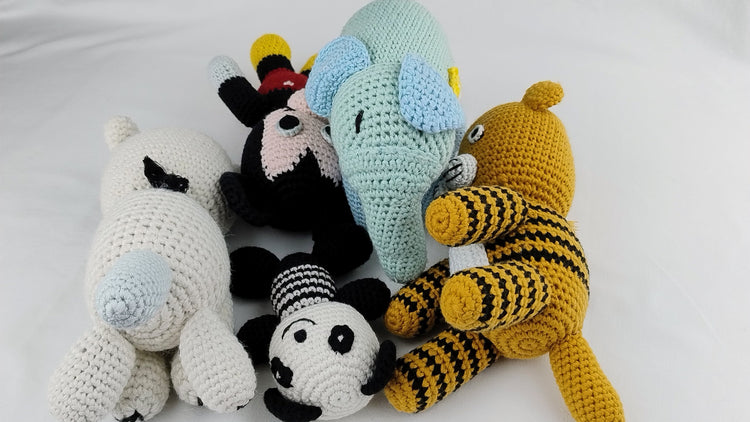 Handmade crochet amigurumi animals group, including elephant, panda, bear, and dog from Cepaale