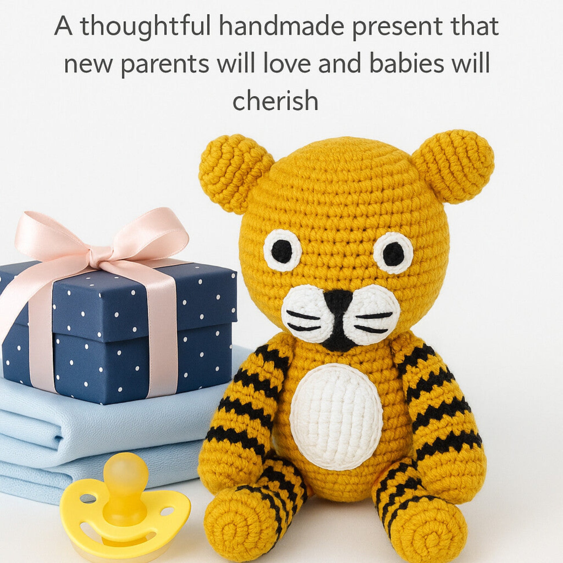 Thoughtful handmade crochet tiger present perfect for new parents and babies, gift wrapped with ribbon