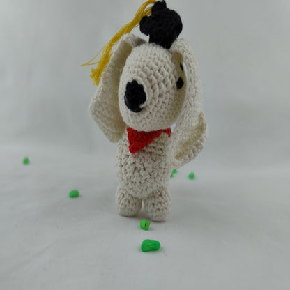 Handmade crochet graduation dog amigurumi aerial view detailed stitching artisan gift
