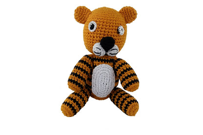 Front facing view of handmade tiger crochet toy with black and brown stripes and white belly patch