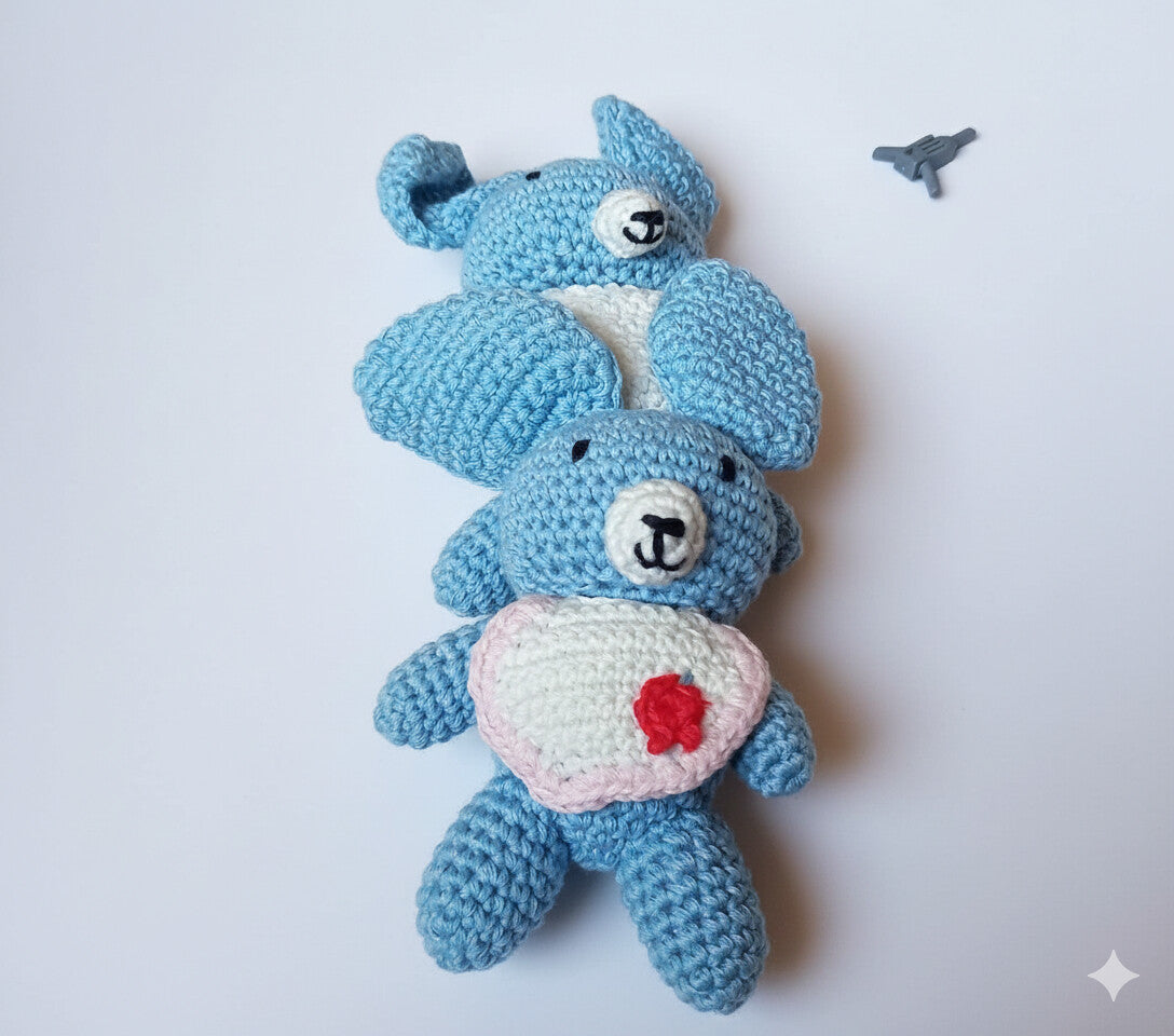 Top view of a pair of blue handmade koala amigurumi gift set, featuring crochet craftsmanship and made in Italy by Cepaale